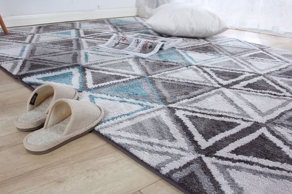 Stylowe dekoracje podłogi: jak dobrze wybrać dywan